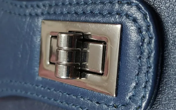 Navy Blue genuine leather handbag lock & hook close-up — premium ladies bag hardware Bangladesh, women's party bag detail